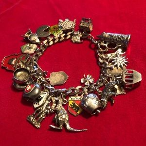 Lot of Vintage charms and bracelet. Many silver. Charms from Europe in the 70's.